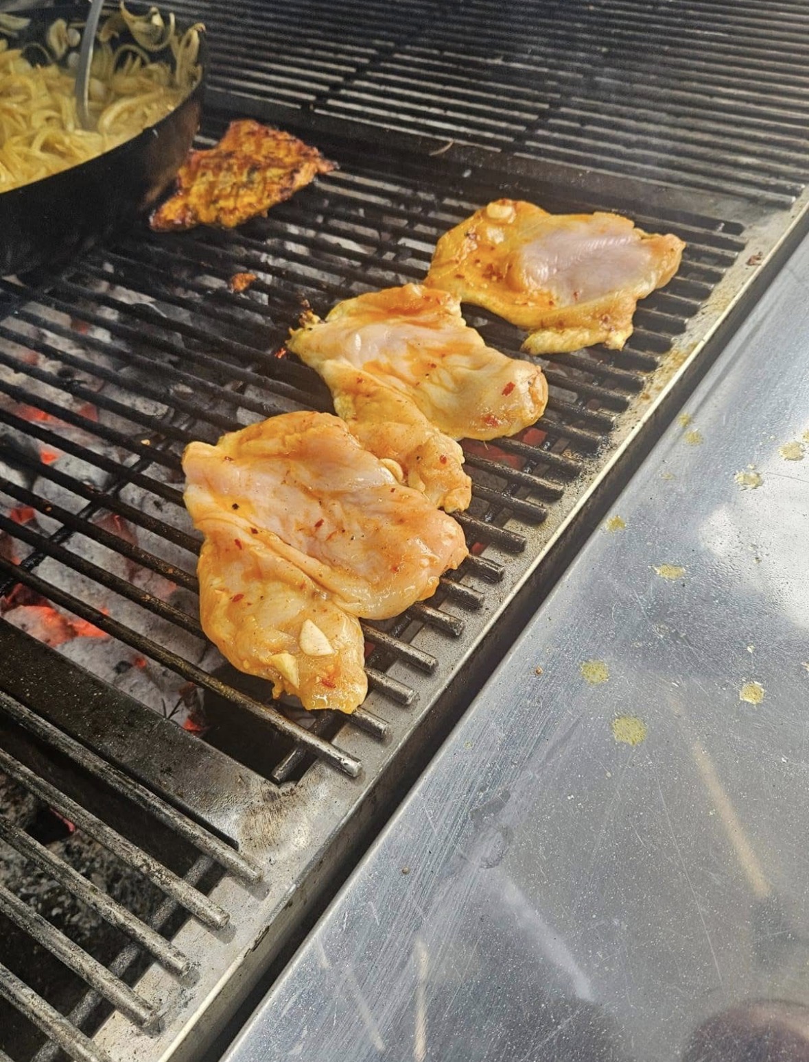 Chicken fillets seasoned on the grill